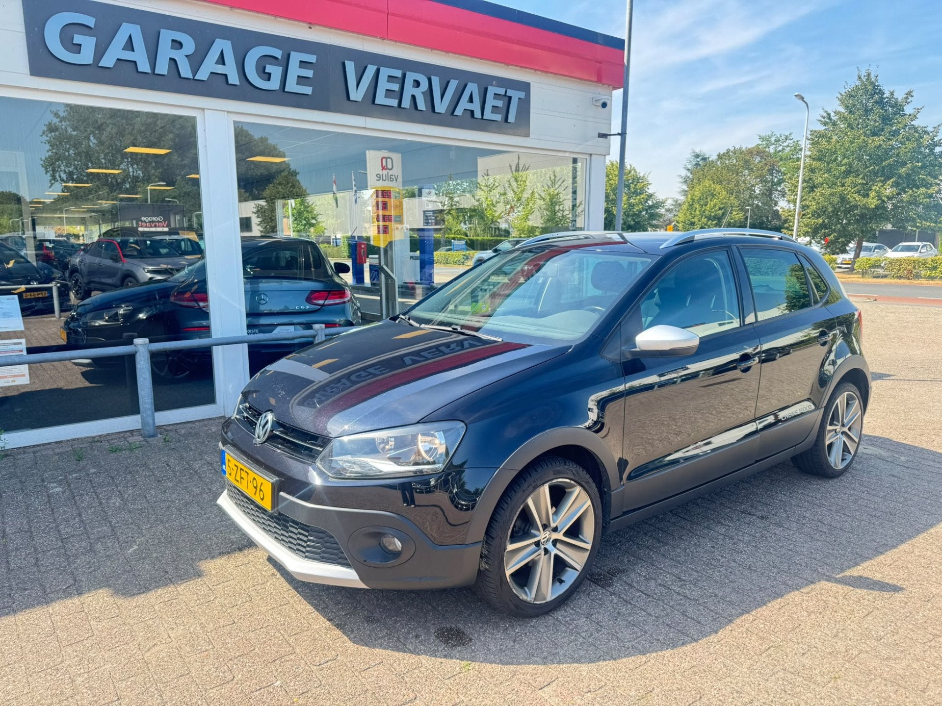 Volkswagen Polo 1.2 TSI Cross (bj 2015), Voorwielaandrijving, Euro 5, Stof, Zwart