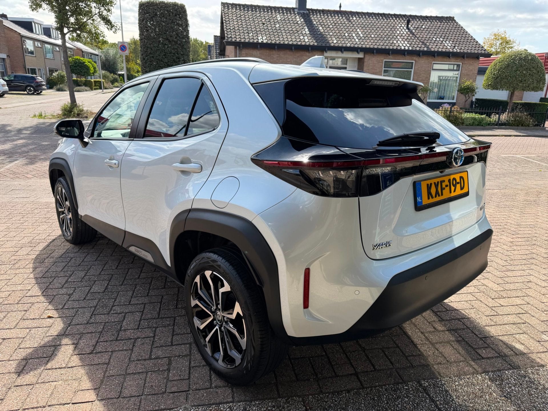 Toyota Yaris Cross 1.5 Hybrid Dynamic|Half Leder|PDC, Dealer onderhouden, Gebruikt, Met garantie (alle), Leder en Stof
