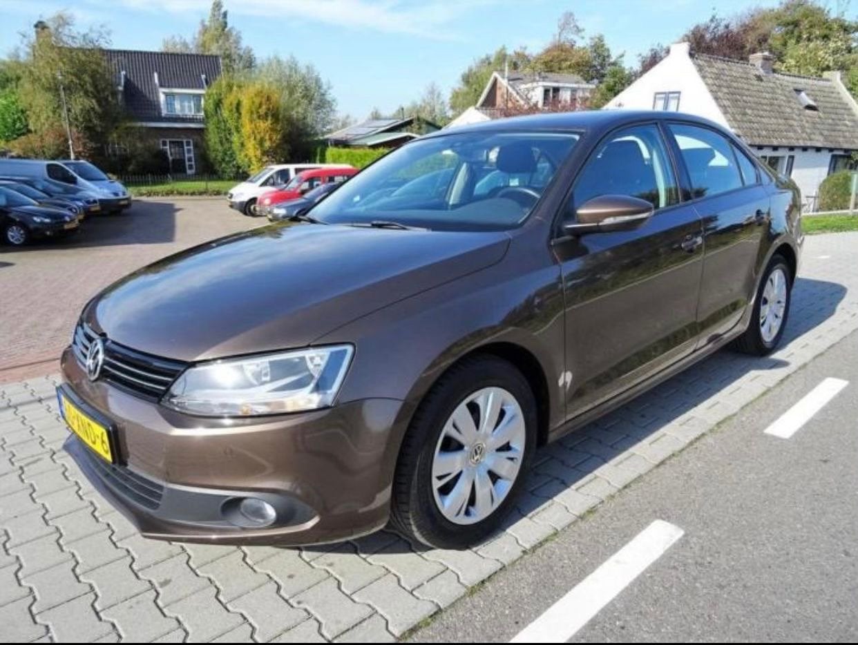 Foto 7 van Volkswagen Jetta 1.2TSI 77KW H6 2012 Bruin