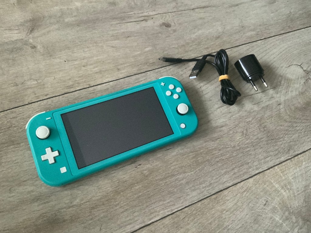 Mooie Nintendo Switch Lite + Oplader, Spelcomputers en Games, Spelcomputers | Nintendo Switch Lite, Ophalen of Verzenden, Turquoise