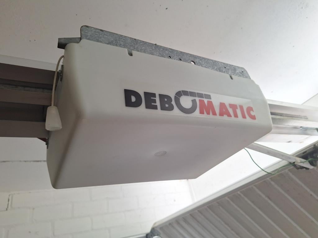 Debomatic Garagedeuropener met 3 handzenders, Ophalen, Gebruikt, Garagedeur, 120 cm of meer