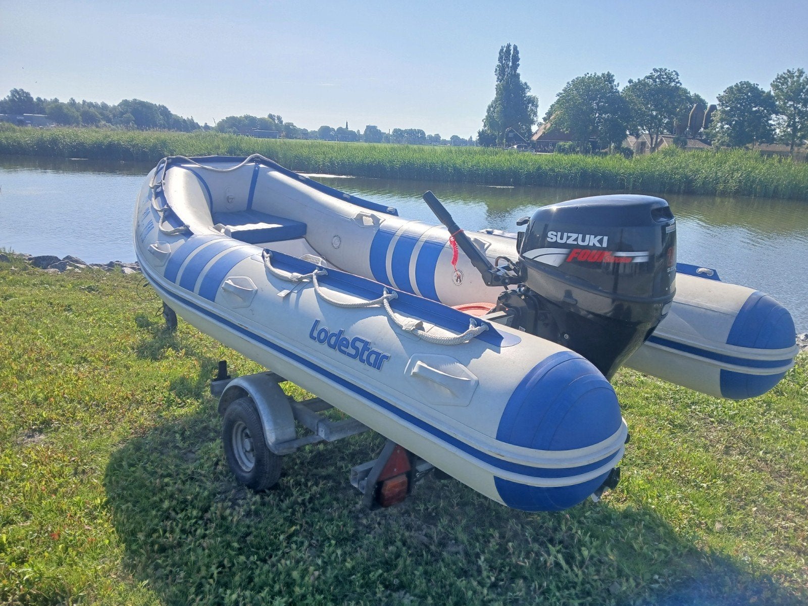 Lodestar 410 met Suzuki 4 takt 25PK met trailer!!, Watersport en Boten, Rubberboten, Lodestar, 5 m, Ophalen of Verzenden, Zo goed als nieuw