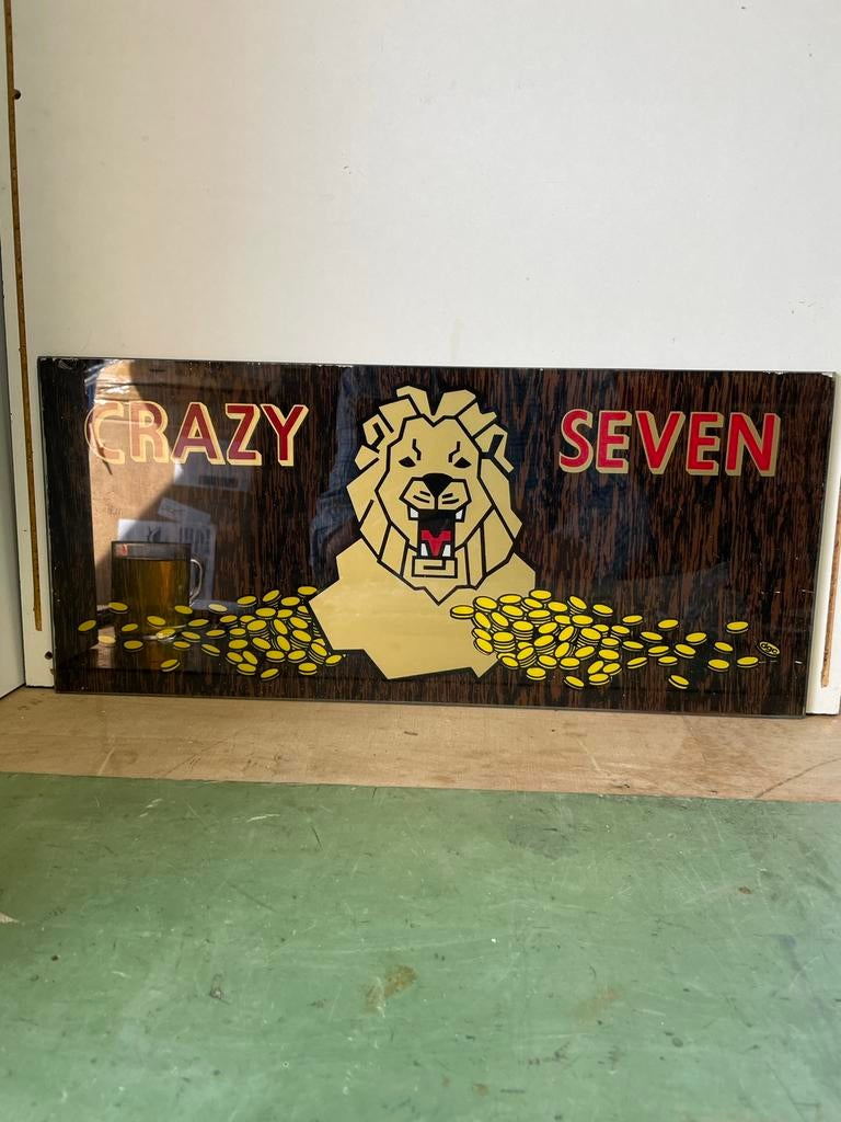 Crazy Seven onder ruit., Overige munten, Ophalen of Verzenden, Zo goed als nieuw