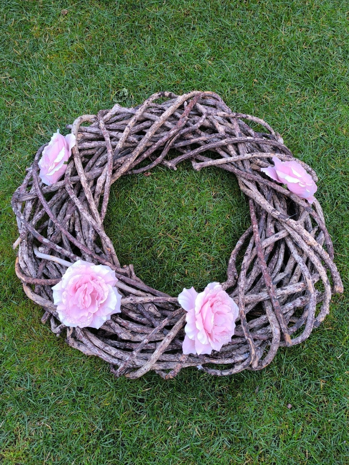 Mooi vogelnest/krans met roze bloemen, Huis en Inrichting, Woonaccessoires | Kransen, Ophalen of Verzenden, Zo goed als nieuw