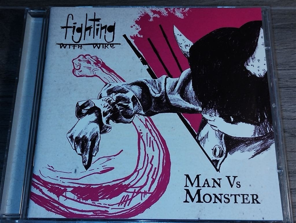 Fighting With Wire ‎- Man Vs Monster, Ophalen of Verzenden, Zo goed als nieuw, Poprock