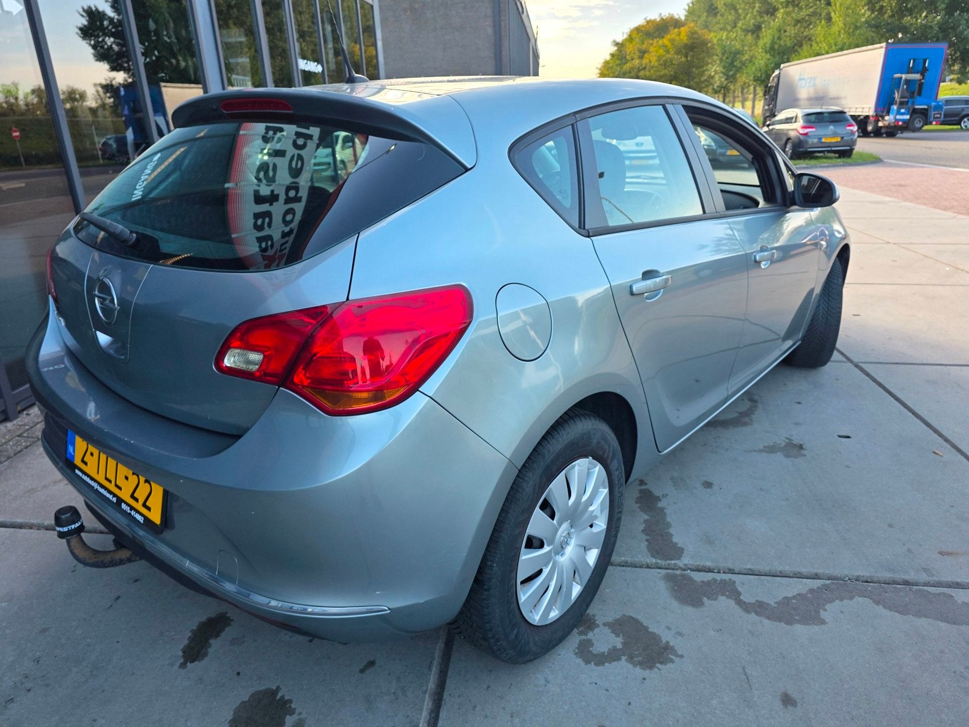 Opel Astra 1.4 Turbo Rhythm - Trekhaak - Airco, Auto's, Opel, Voorwielaandrijving, Euro 5, Stof, Gebruikt