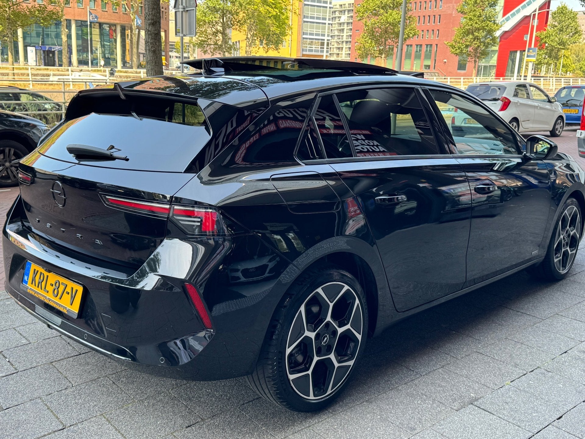 Opel ASTRA 1.2 Turbo Ultimate, Auto's, Gebruikt, 1199 cc, Alcantara, Zwart