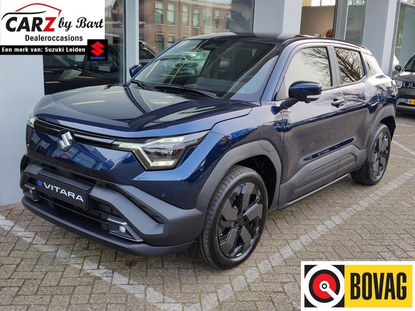 Suzuki e Vitara STYLE 61 kWh | DEMO DEAL! | Garantie tot 203, 12 maanden, Blauw, Leder en Stof, Origineel Nederlands