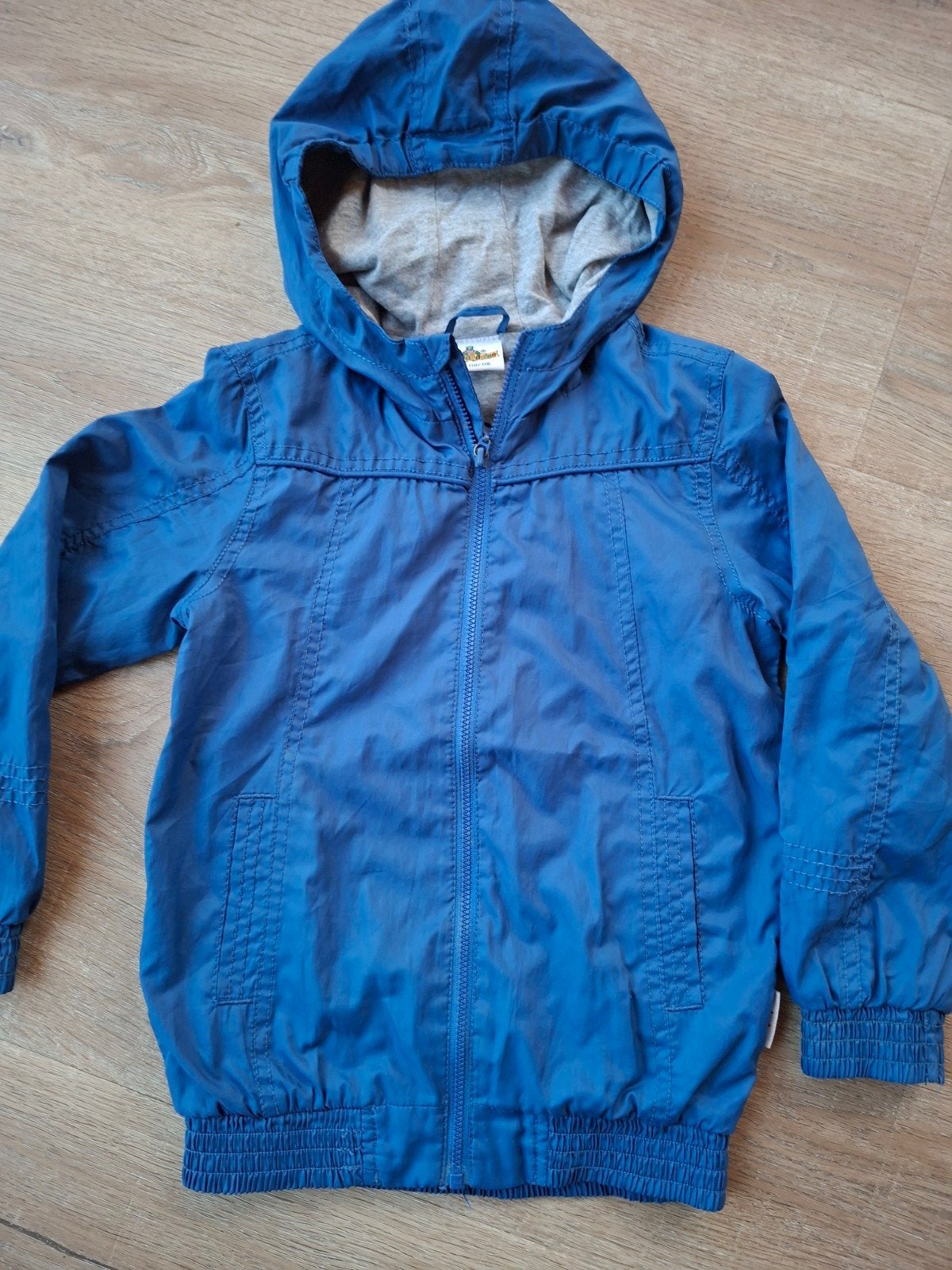 Blauwe jas met capuchon voor jongens, maat 110/116, Ophalen of Verzenden, Zo goed als nieuw, Jongen, Papagino