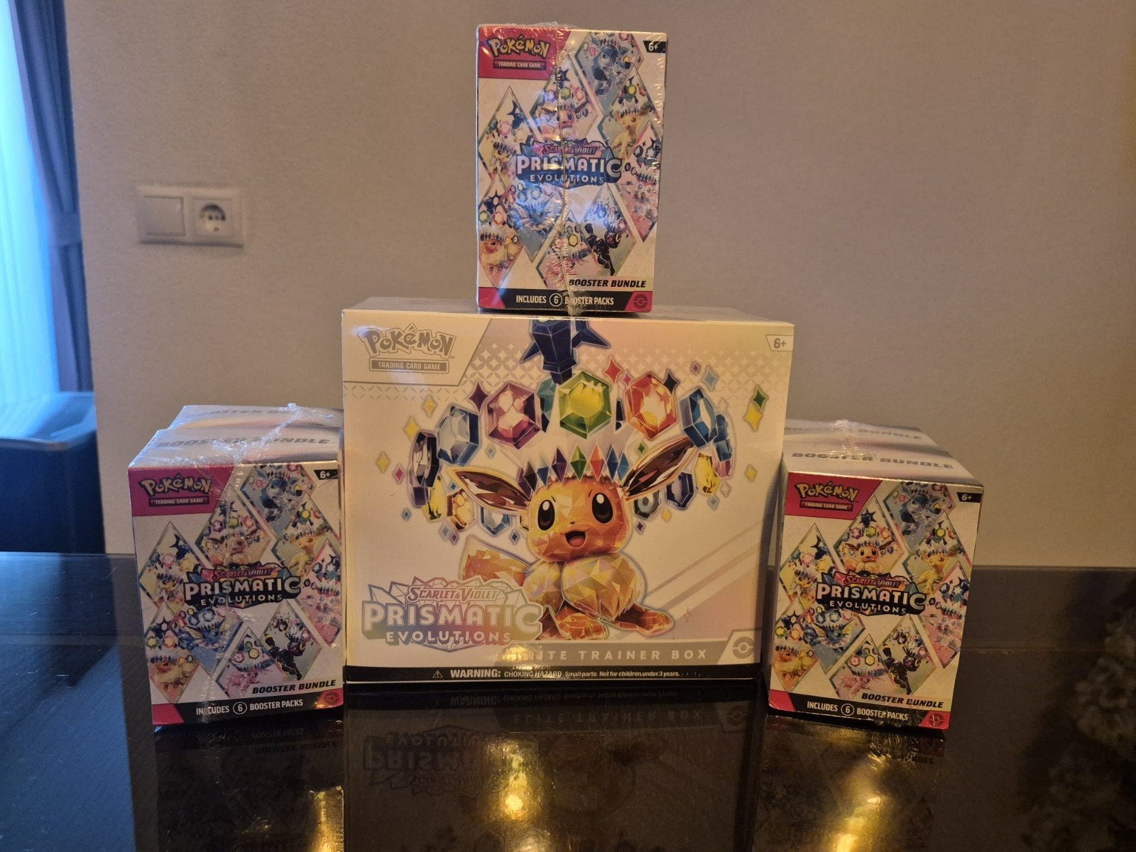 Pokémon Prismatic Evolutions ETB en Booster bundle, Ophalen of Verzenden, Nieuw, Boosterbox