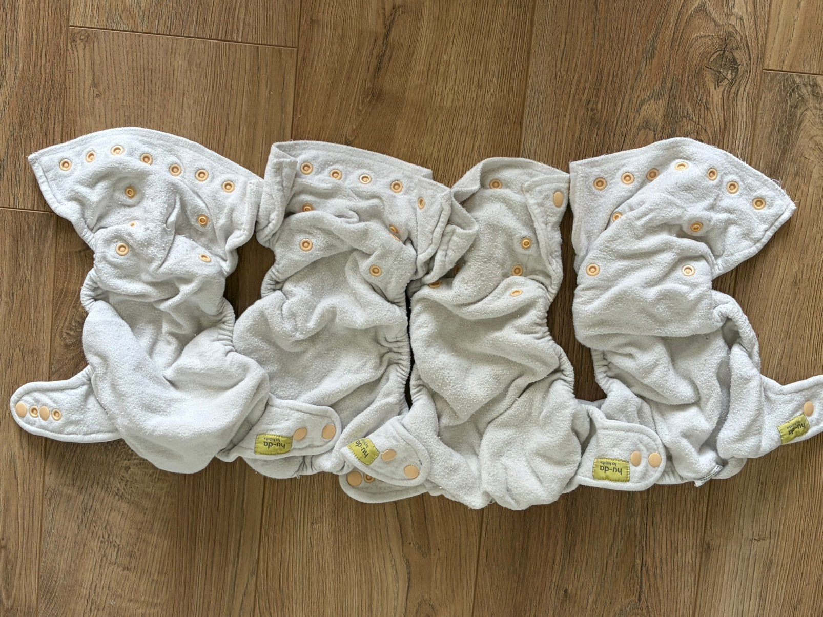 Hu-Da - Verstelbare bamboeluier met drukknoopjes (4x), Ophalen of Verzenden, Gebruikt, Jongetje of Meisje