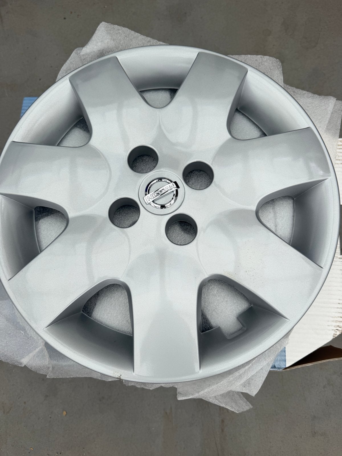3x Ongebruikte Nissan wieldoppen 15 inch, Ophalen of Verzenden, Nieuw