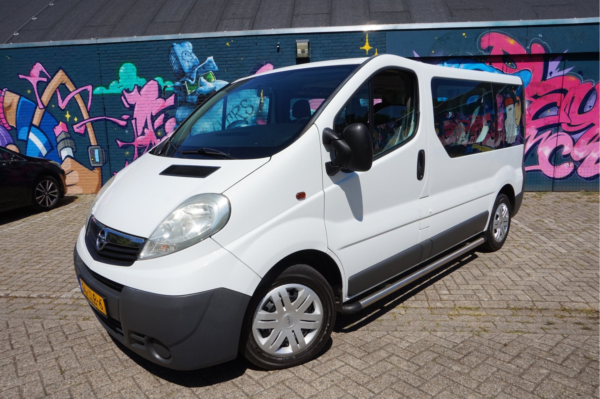 Opel Vivaro Combi 2.0i L1H1 9 persoons (bj 2009), 1998 cc, 2000 kg, Wit, Bedrijf