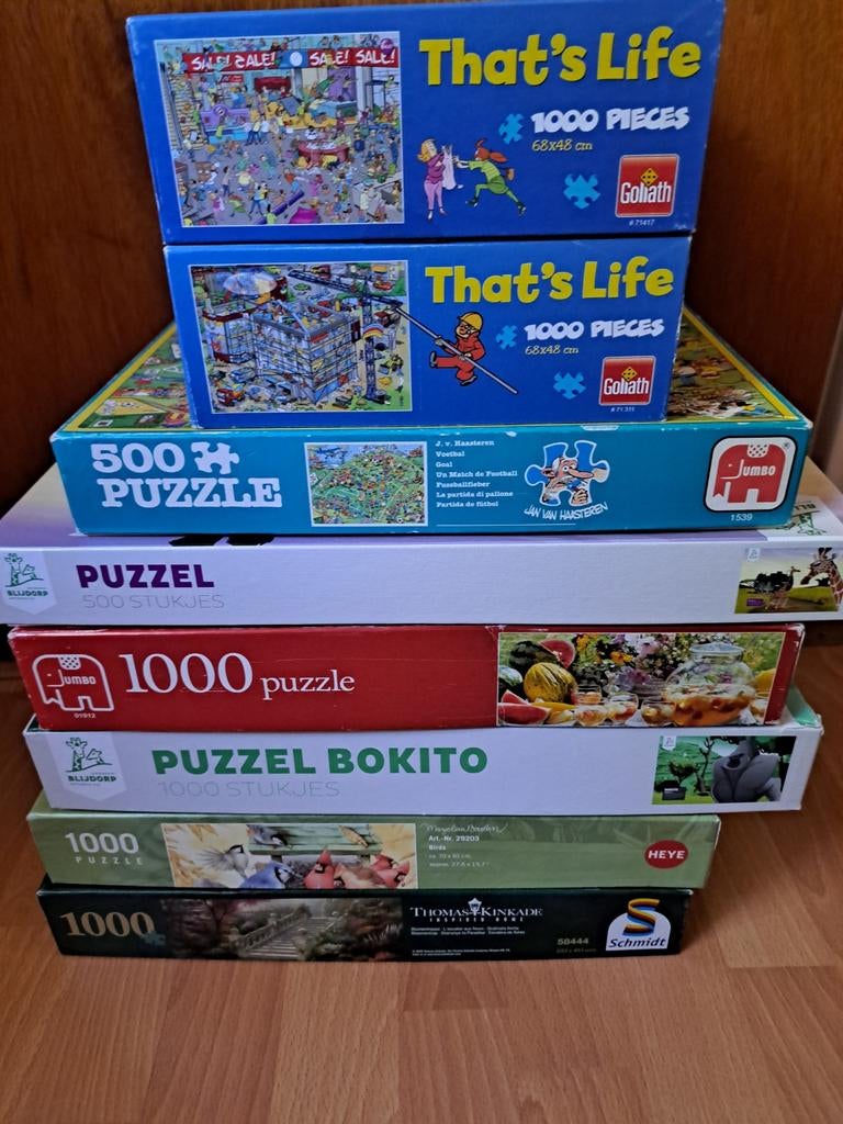 Stapel puzzels 7x 1000 1x 500, Ophalen, 500 t/m 1500 stukjes, Zo goed als nieuw