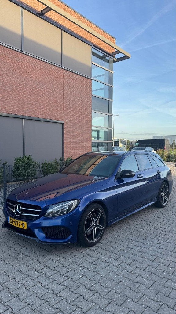 2018 Mercedes-Benz C 180 Estate (S205) AMG Line, Auto's, Automaat, Achterwielaandrijving, 1800 kg, Blauw