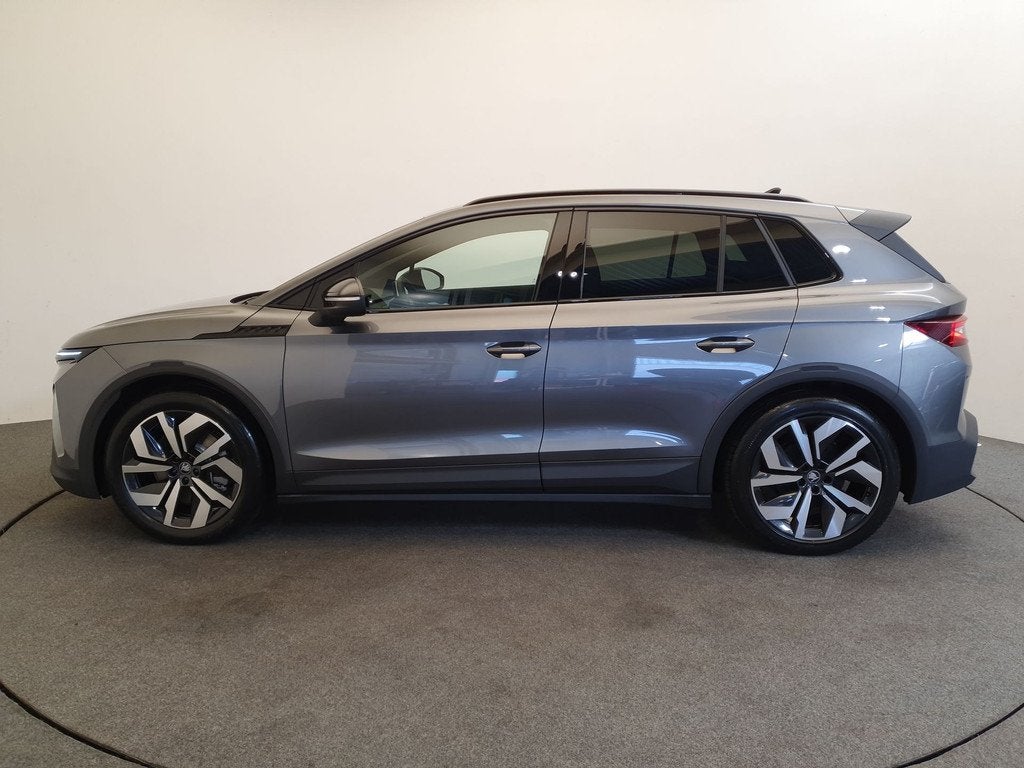 Skoda Elroq 85 Sportline Wegklapbare trekhaak, Camera, Auto's, Skoda, Automaat, 12 maanden, Achterwielaandrijving, Zwart