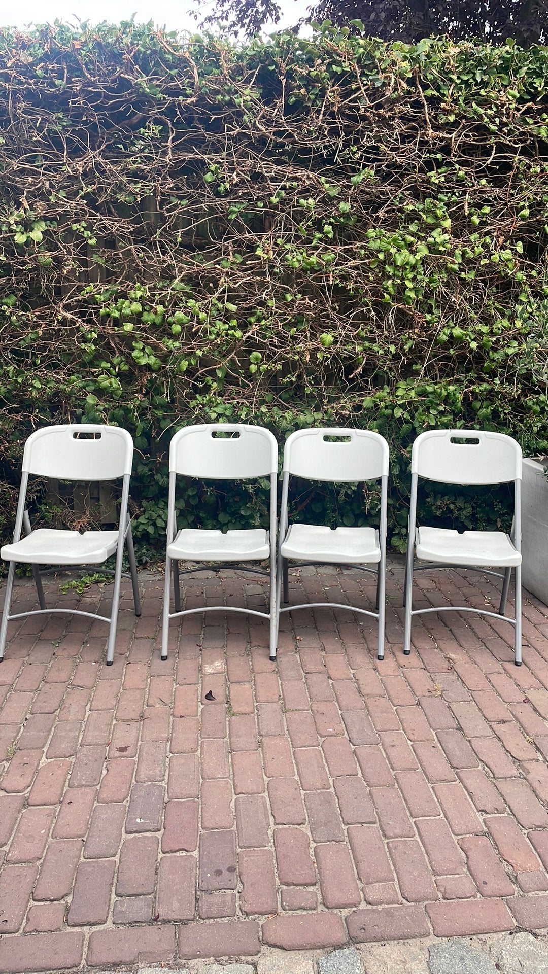 Klapstoelen vier stuks, Huis en Inrichting, Stoelen, Ophalen, Zo goed als nieuw, Grijs, Vier