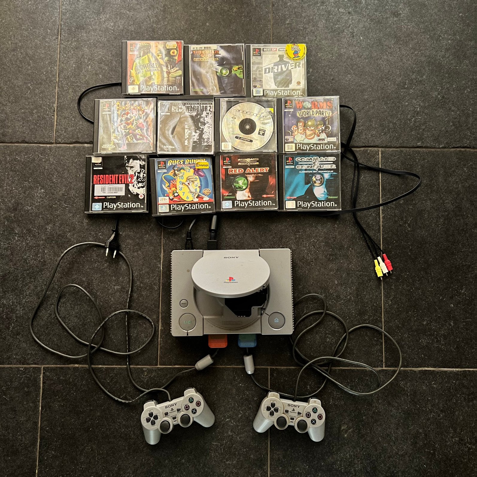 PlayStation 1 (PS1) Compleet, Ophalen of Verzenden, Zo goed als nieuw, Met 2 controllers, Met games