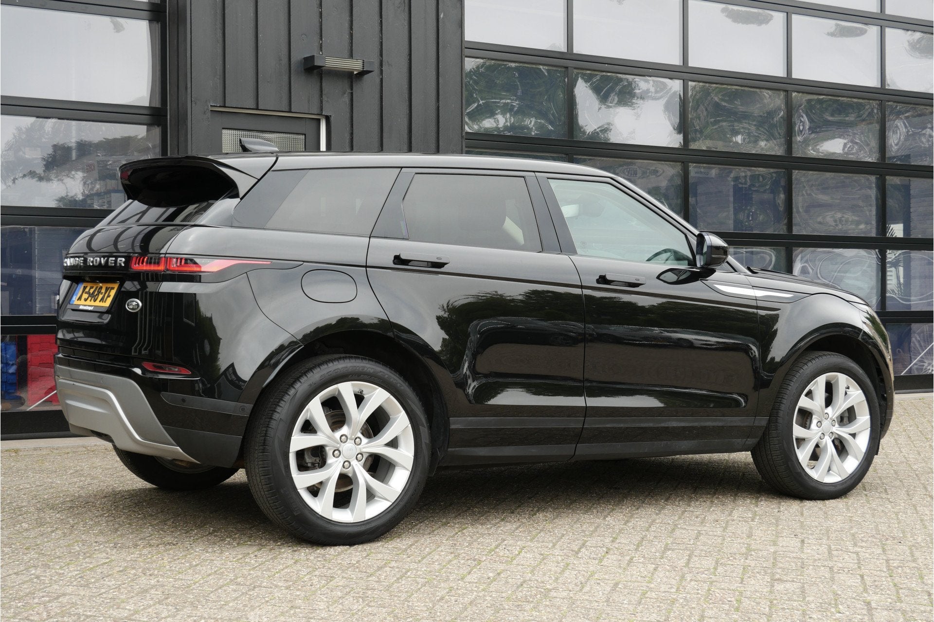 Land Rover Range Rover Evoque 2.0 P200 AWD 200PK | Memory |, Auto's, 1800 kg, 4 cilinders, Zwart, Bedrijf