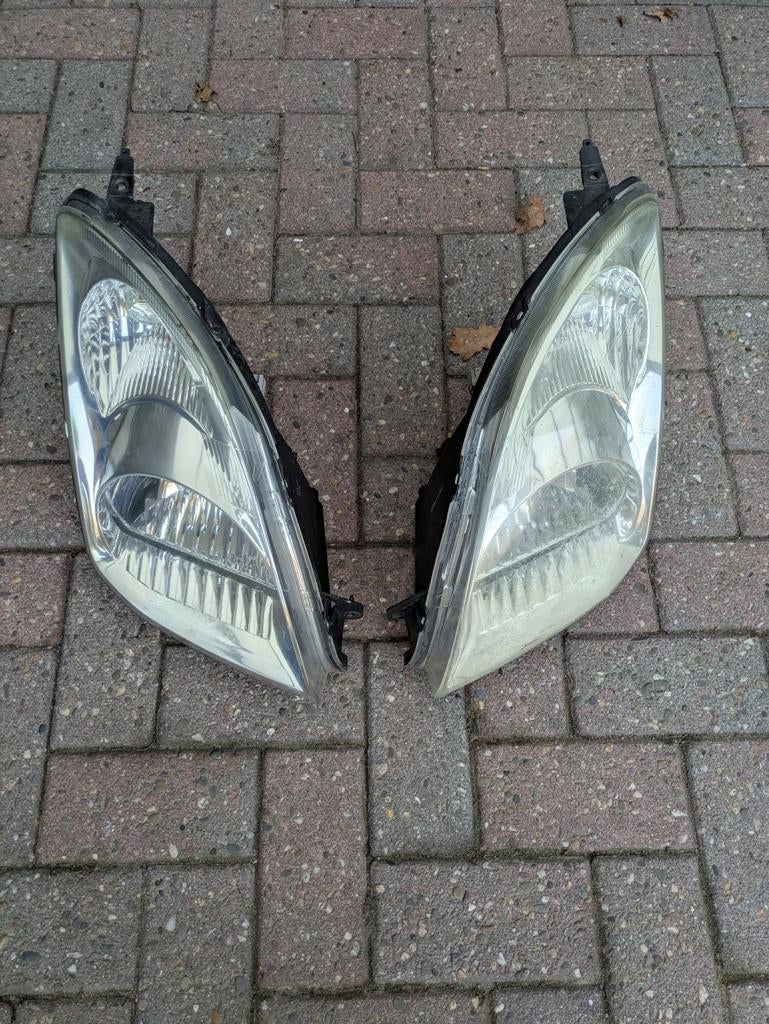 Suzuki Swift II koplampen, Ophalen