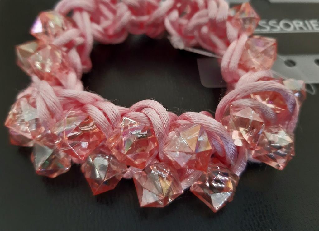 Nieuwe haar elastiek met doorzichtig plastic steentjes., Ophalen of Verzenden, Nieuw, Overige typen