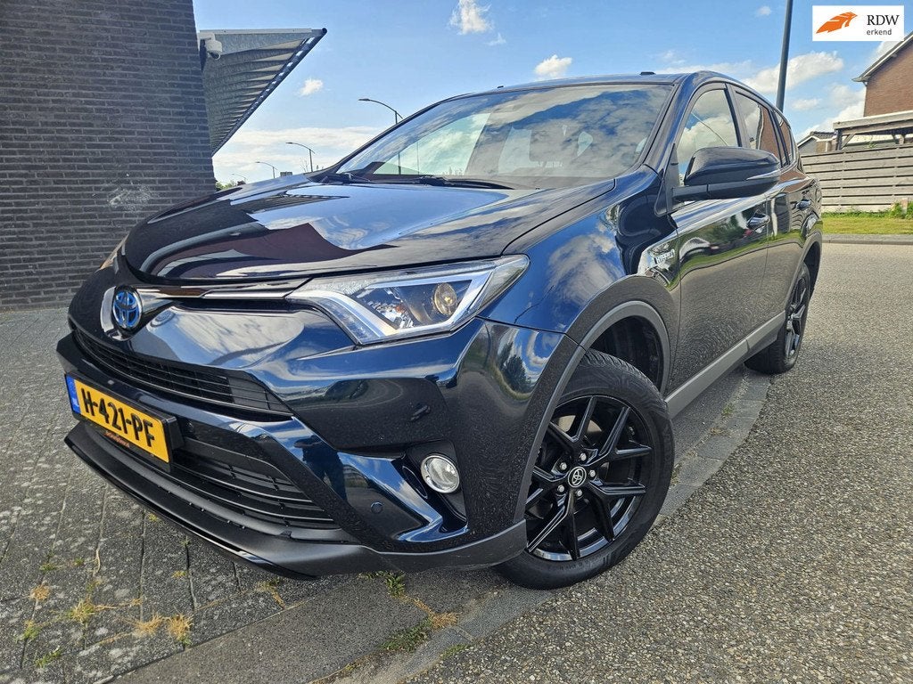 Toyota RAV4 2.5 Hybrid AWD Dynamic GARANTIE Parelmoer Kleur, Auto's, Toyota, Gebruikt, Euro 6, Zwart, Bedrijf