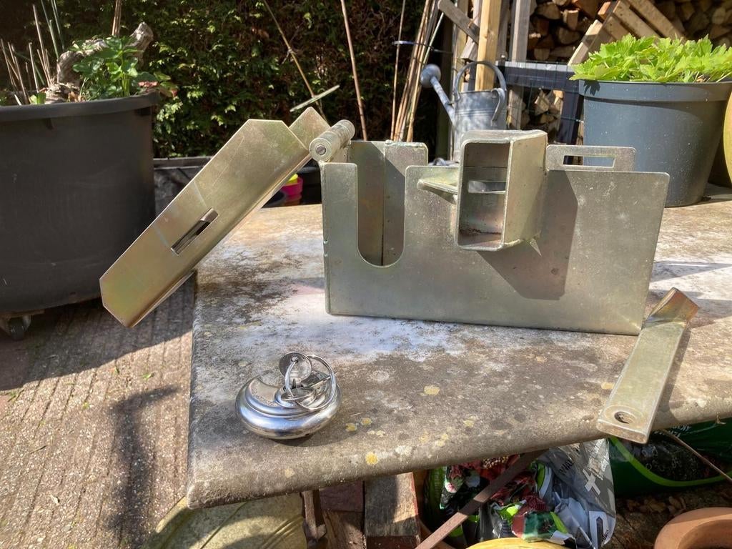 Robuust disselslot + Abus ringslot, Ophalen