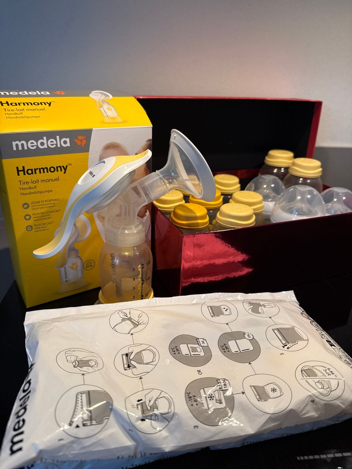 Medela Harmony handkolf met accessoires, Ophalen of Verzenden, Gebruikt