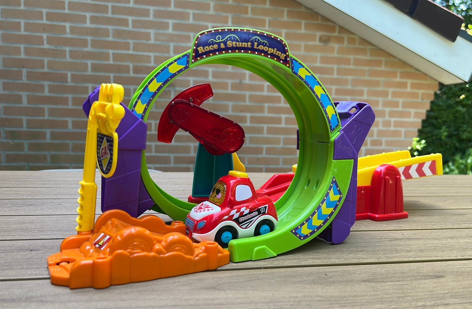 VTech Toet Toet Auto's Race & Stunt Looping, Kinderen en Baby's, Speelgoed | Vtech, Ophalen, Zo goed als nieuw, 2 tot 4 jaar