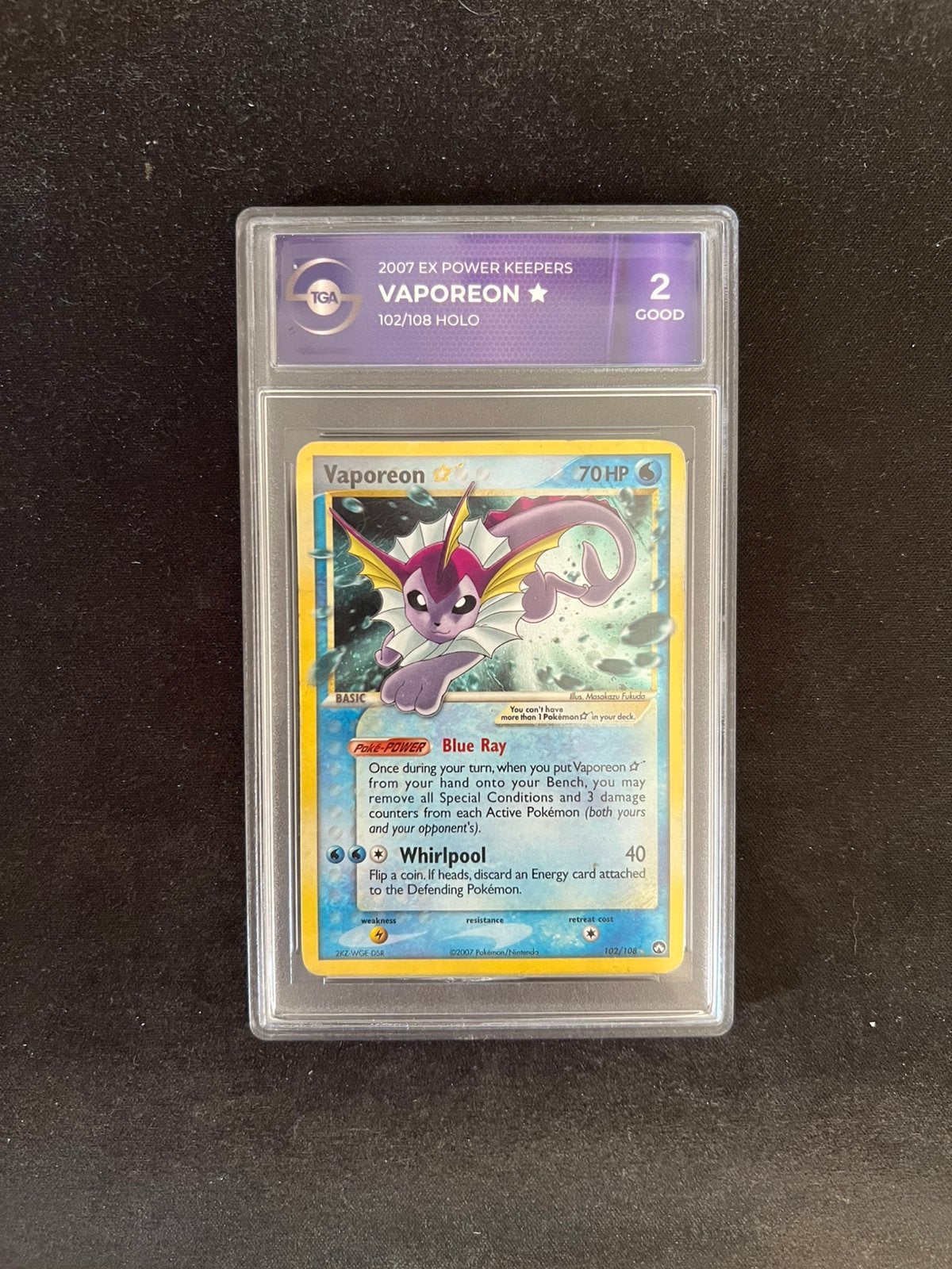 Vaporeon Gold Star Graded Pokemon Kaart TGA 2, Ophalen of Verzenden, Zo goed als nieuw, Losse kaart, Foil