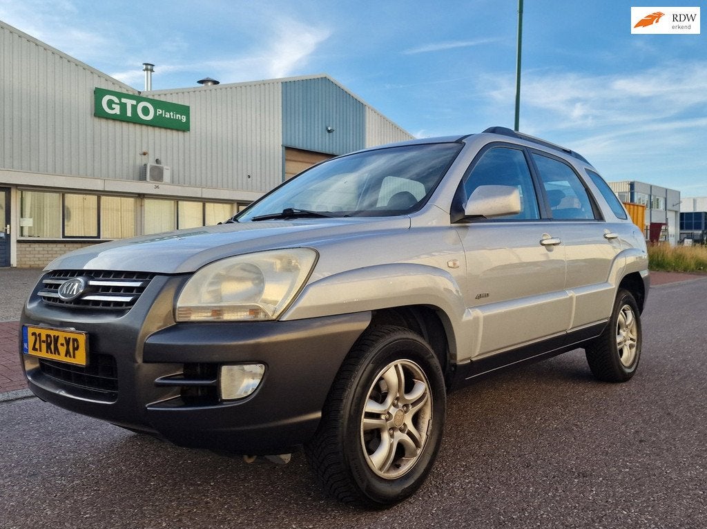 Kia Sportage 2.0 CVVT Adventure 4WD AIRCO CRUISE TREKHAAK, Auto's, Kia, Gebruikt, 4 cilinders, Origineel Nederlands, Bedrijf