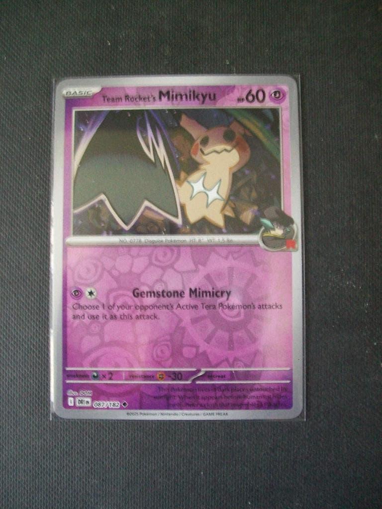 1124. Nieuwe Pokemon Kaart holofoil TEAM ROCKET's MIMIKYU, Verzenden, Nieuw, Losse kaart, Foil