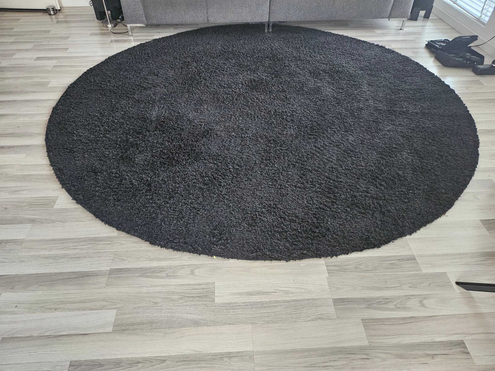 Rond zwart vloerkleed - Zo goed als nieuw, Modern, hoogpolig, Zwart, Rond, Ophalen of Verzenden