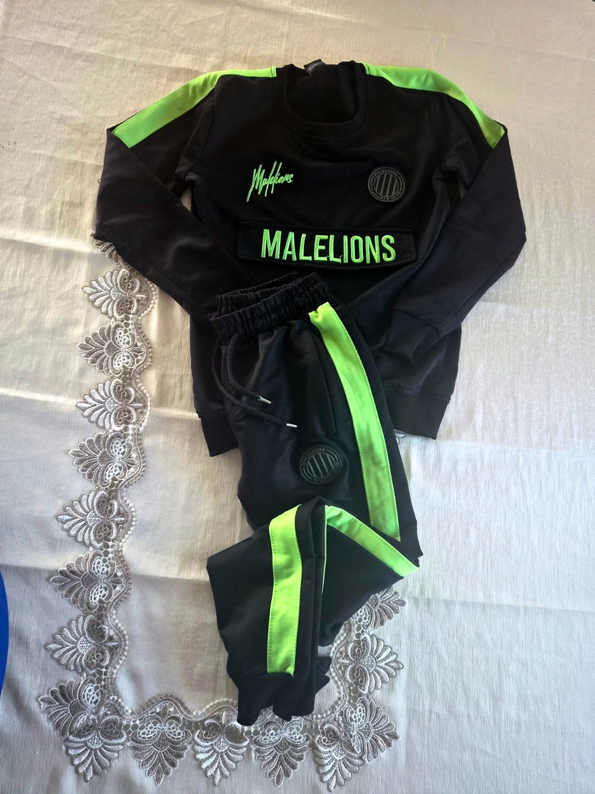 Malelions jongens pak maat S - Zo goed als nieuw, Malelions, Jongen of Meisje, Ophalen of Verzenden, Zo goed als nieuw