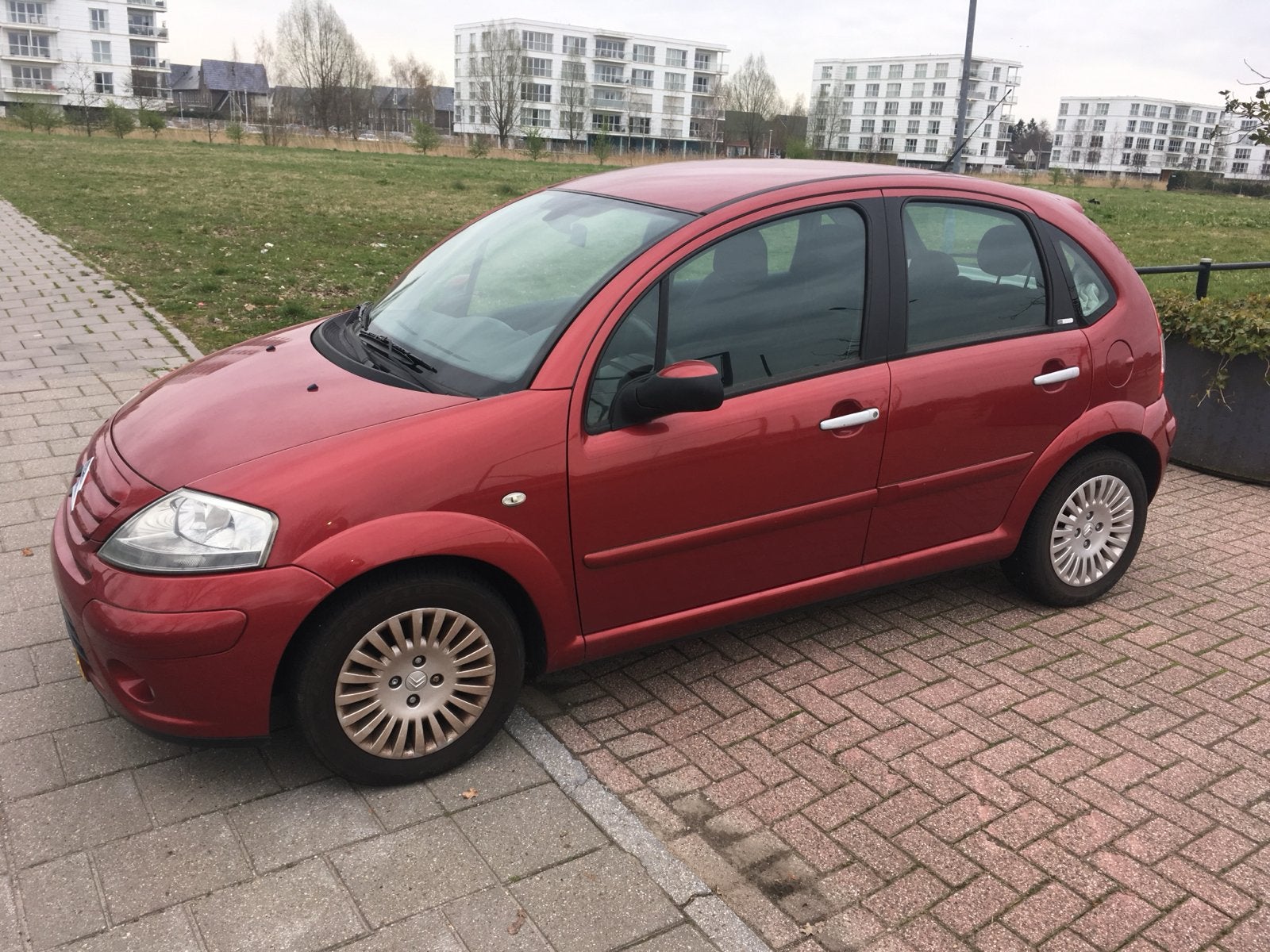 Citroën C3 1.4 I exclusive 2006 Rood, Auto's, Voorwielaandrijving, 1160 kg, 989 kg, Origineel Nederlands