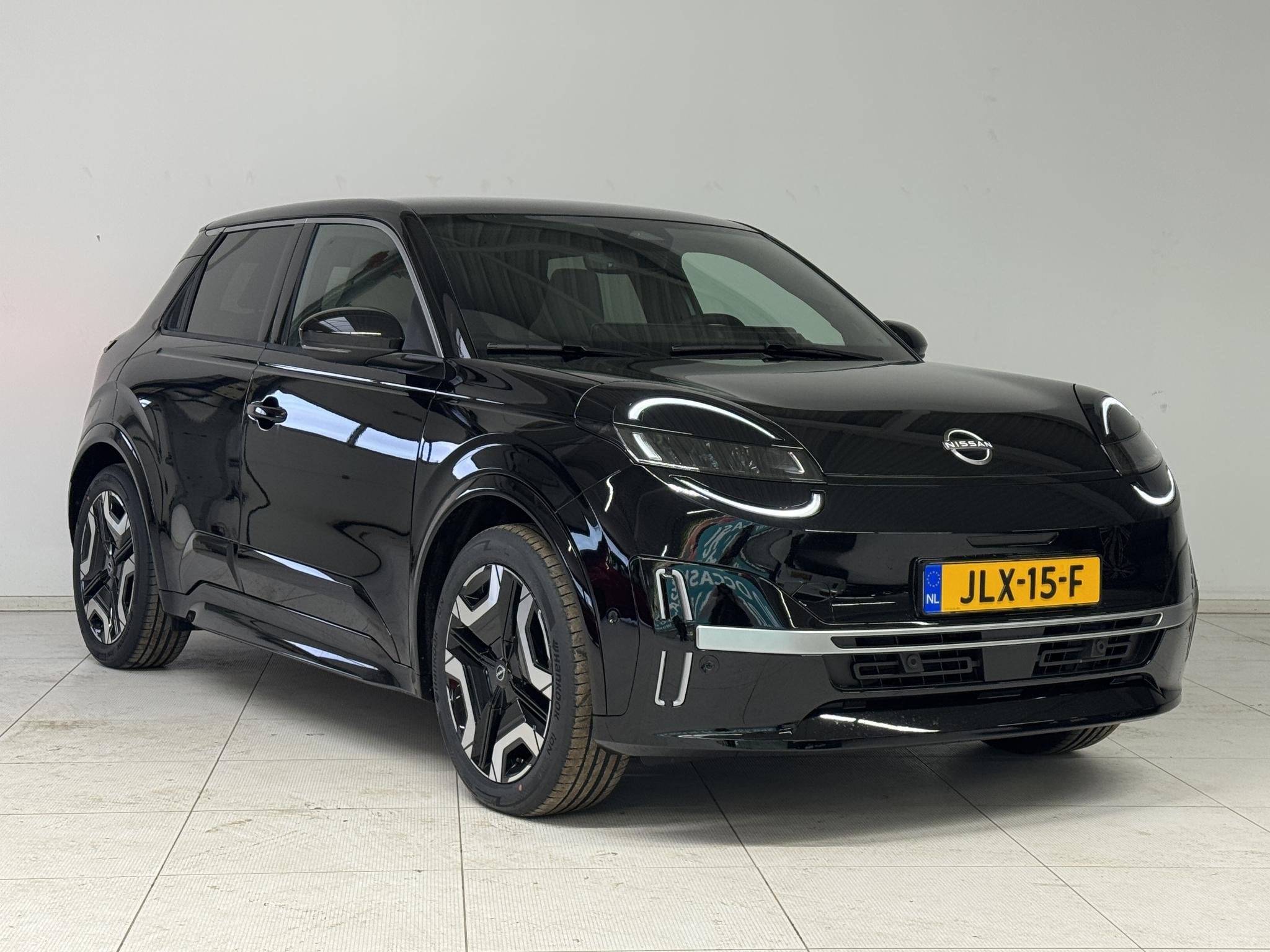Nissan Micra EVOLVE 52 kWh | DEMO | Navigatie | Stoel + Stuu, Stof, Huisgarantie, Origineel Nederlands, 500 kg