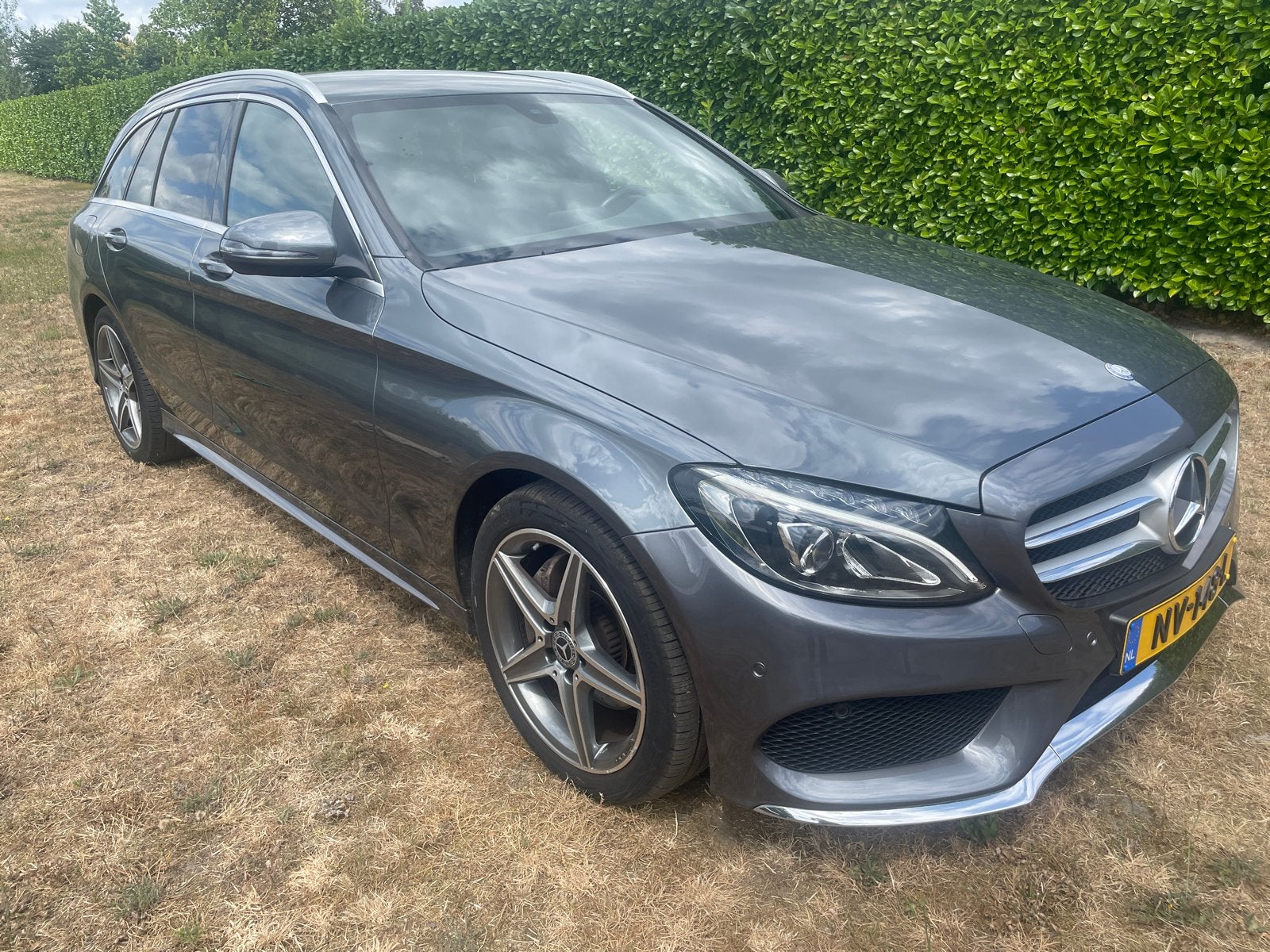 Mercedes-Benz C-Klasse C180AMG. Aut7 Estate 2017 Grijs, Auto's, Automaat, Achterwielaandrijving, 1800 kg, Zwart