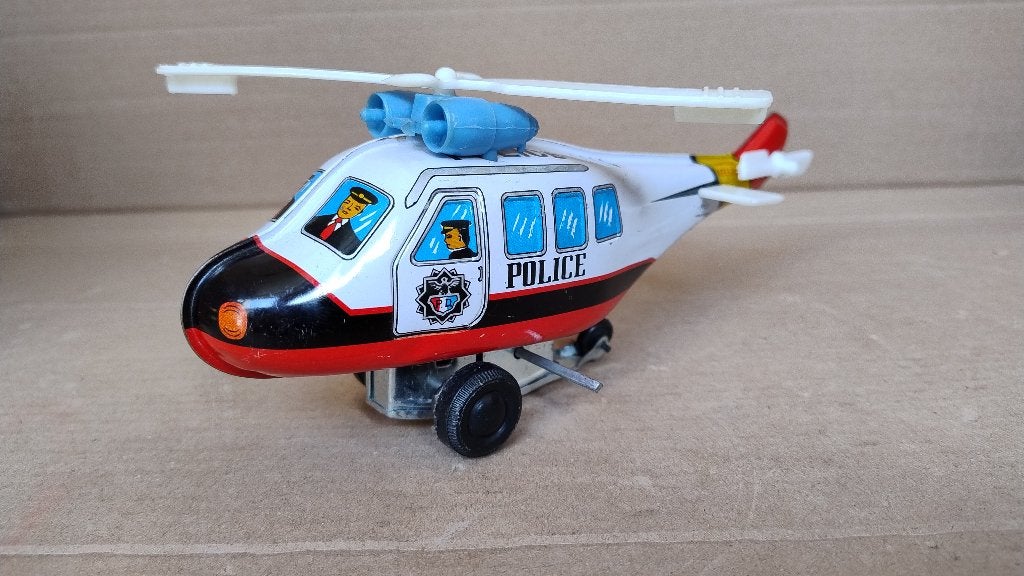 Blikken speelgoed opwind politie helicopter, Antiek en Kunst, Antiek | Speelgoed, Ophalen of Verzenden
