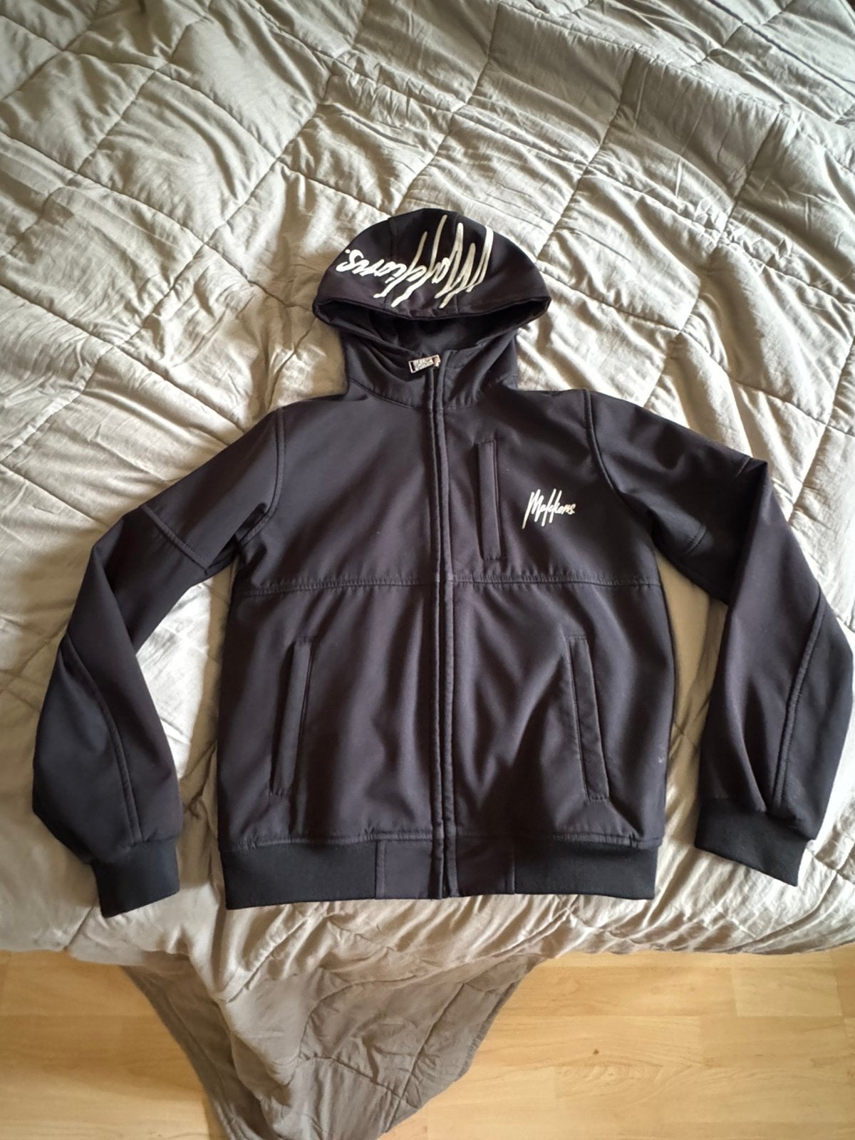 Malelions Junior Signature Softshell jas zwart – maat 152, Ophalen of Verzenden, Zo goed als nieuw, Jongen of Meisje, Jas
