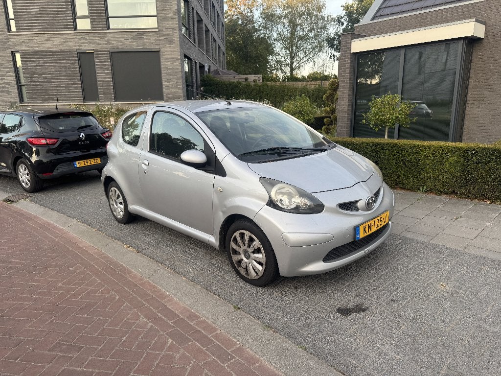 Toyota Aygo 1.0 | 2006 | Bieden mag!, Auto's, Stof, 68 pk, Handgeschakeld, Grijs