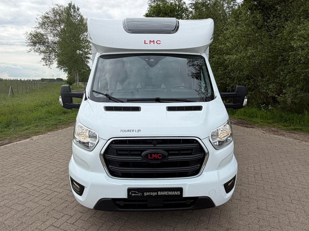 LMC CAMPER Tourer Lift Ford H 664 G Half-integraal INCLUSIEF, Caravans en Kamperen, Campers, Ringverwarming, Buitenlamp, Navigatie