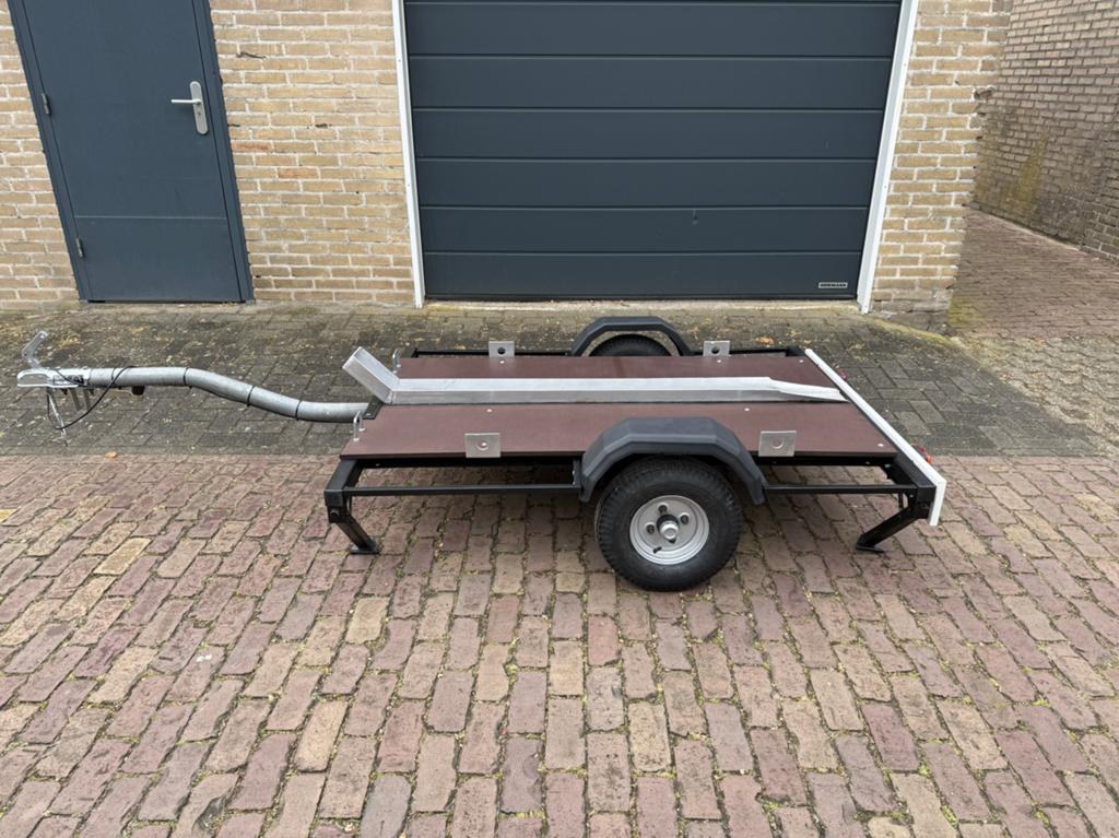 Aanhanger scooters-Brommers, Ophalen