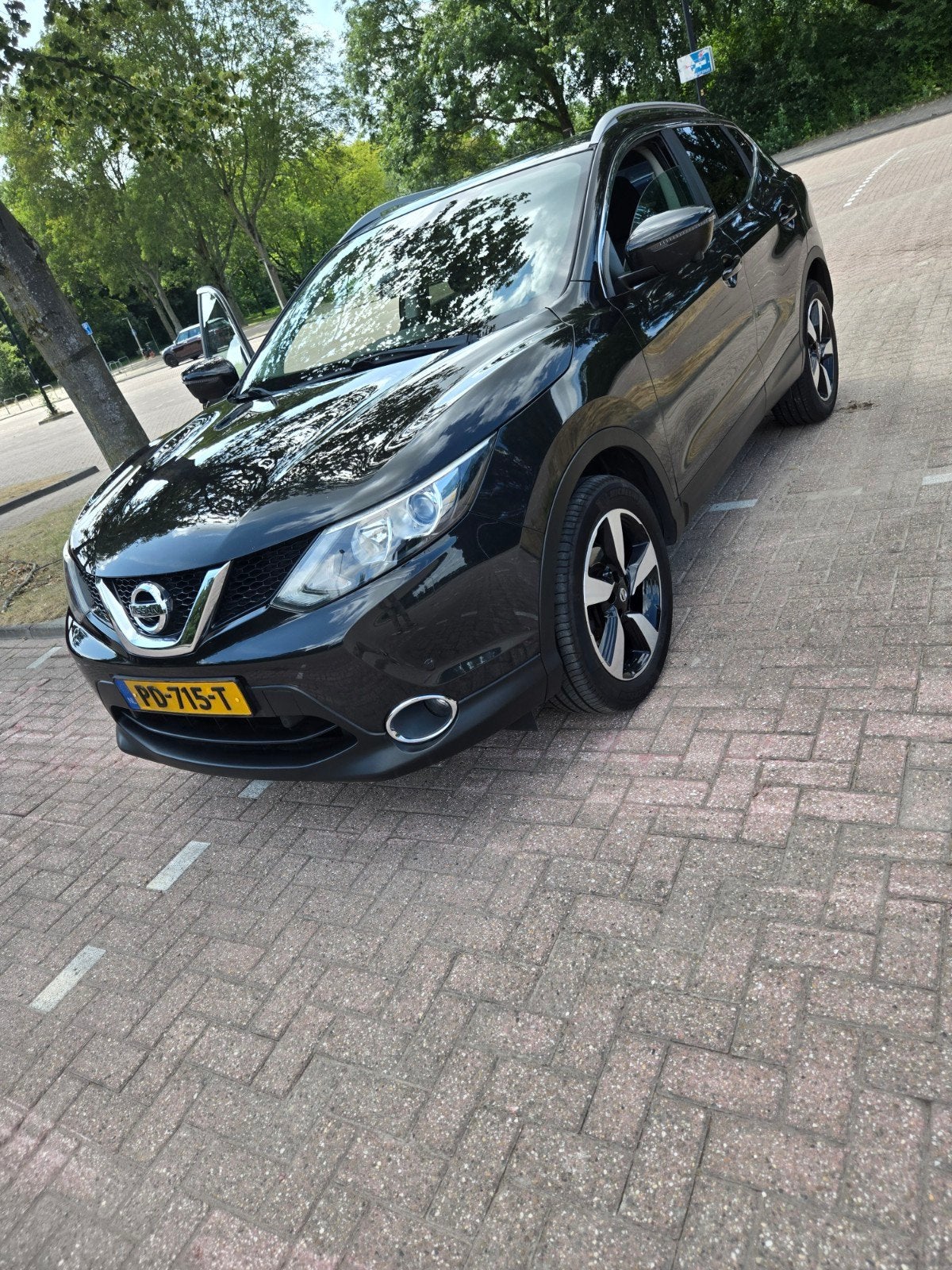 Nissan Qashqai 1.2 Dig-t 85KW 2WD 2017 Zwart, Auto's, Nissan, Voorwielaandrijving, Zwart, 4 cilinders, Leder en Stof