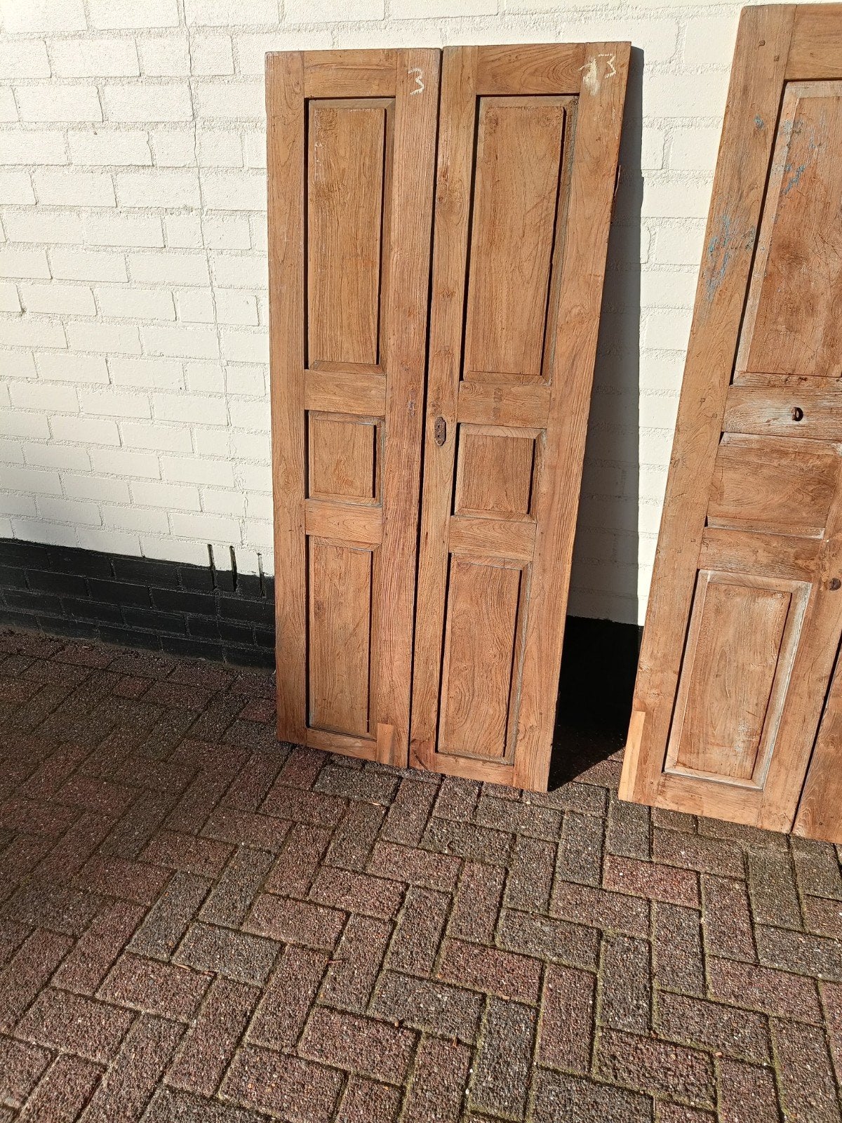 Hardhouten luiken, Ophalen