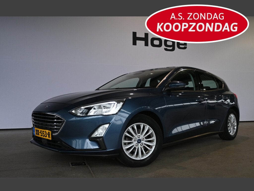 Ford Focus 1.0 EcoBoost Titanium Business Clima Navigatie St, Stof, Gebruikt, Met garantie (alle), Blauw
