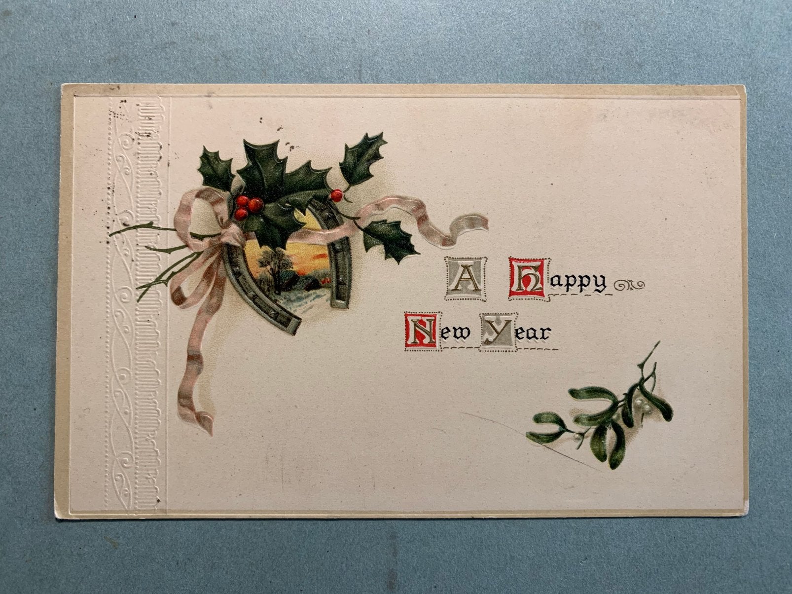 1928 A happy new year - reliëf, Ophalen of Verzenden, 1920 tot 1940, Gelopen, Feest(dag)