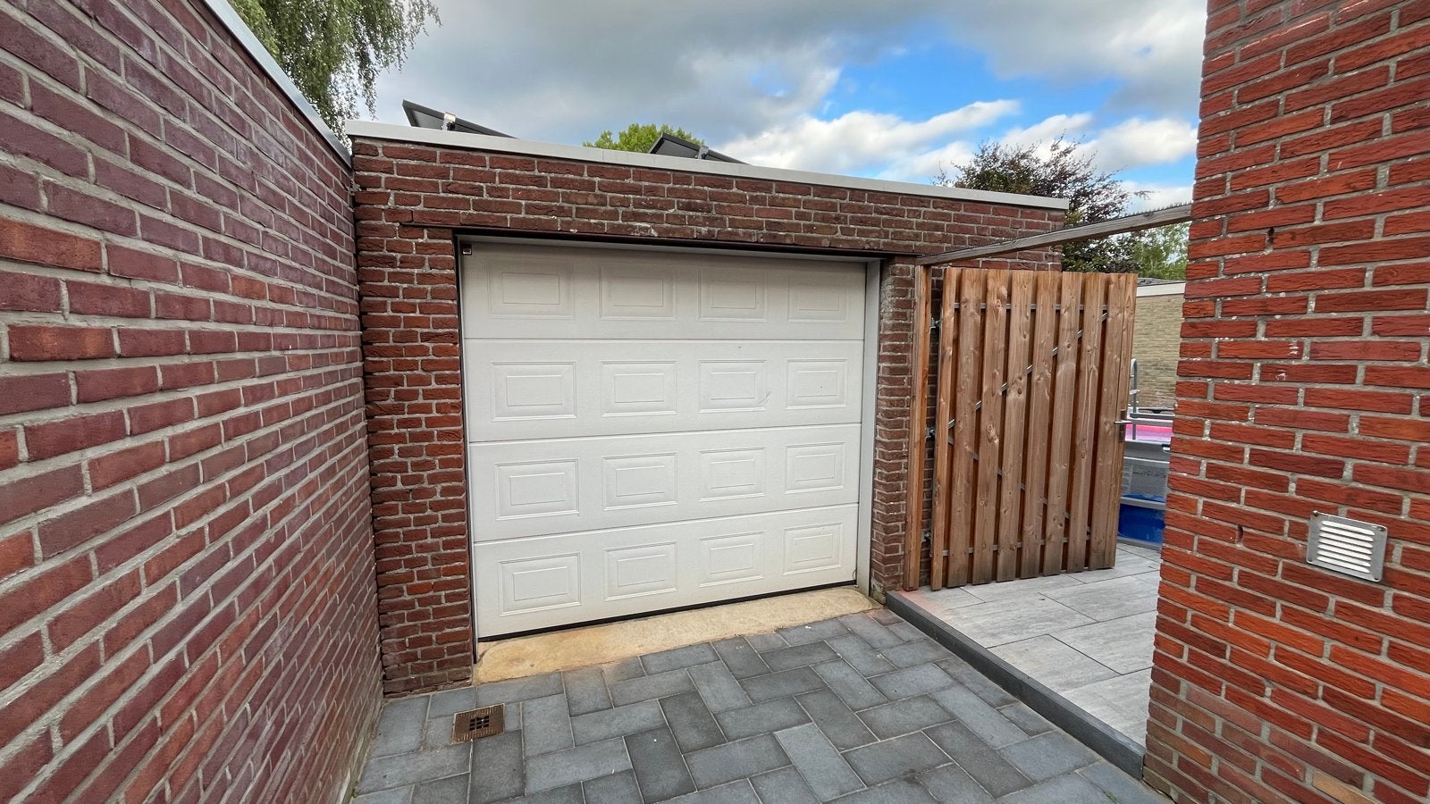 Hormann Garagedeur met FAAC motor en handzender, Ophalen, Gebruikt, Garagedeur, 120 cm of meer