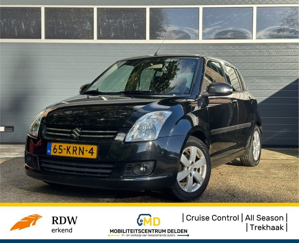 Suzuki SWIFT 1.3 LIMITED / Cruise / Trekhaak / Airco /, Auto's, Voorwielaandrijving, 400 kg, Alcantara, Origineel Nederlands