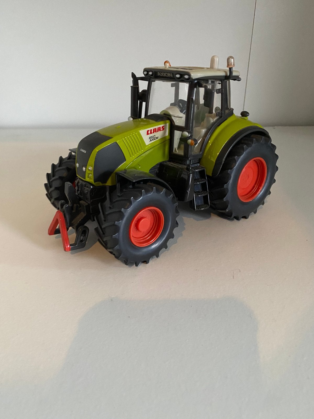 Claas 850 axion miniatuur siku, Hobby en Vrije tijd, Modelauto's | 1:32, Ophalen of Verzenden, Zo goed als nieuw, Tractor of Landbouw