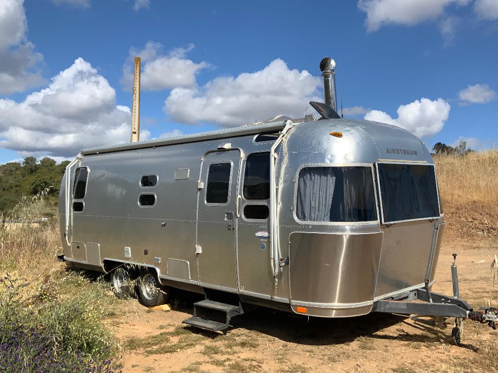 Airstream caravan INTERNATIONAL 25SS (tiny house), Caravans en Kamperen, Overige merken, Vast bed, Rondzit, Luifel